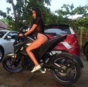 Hot Thai babe on motorbike